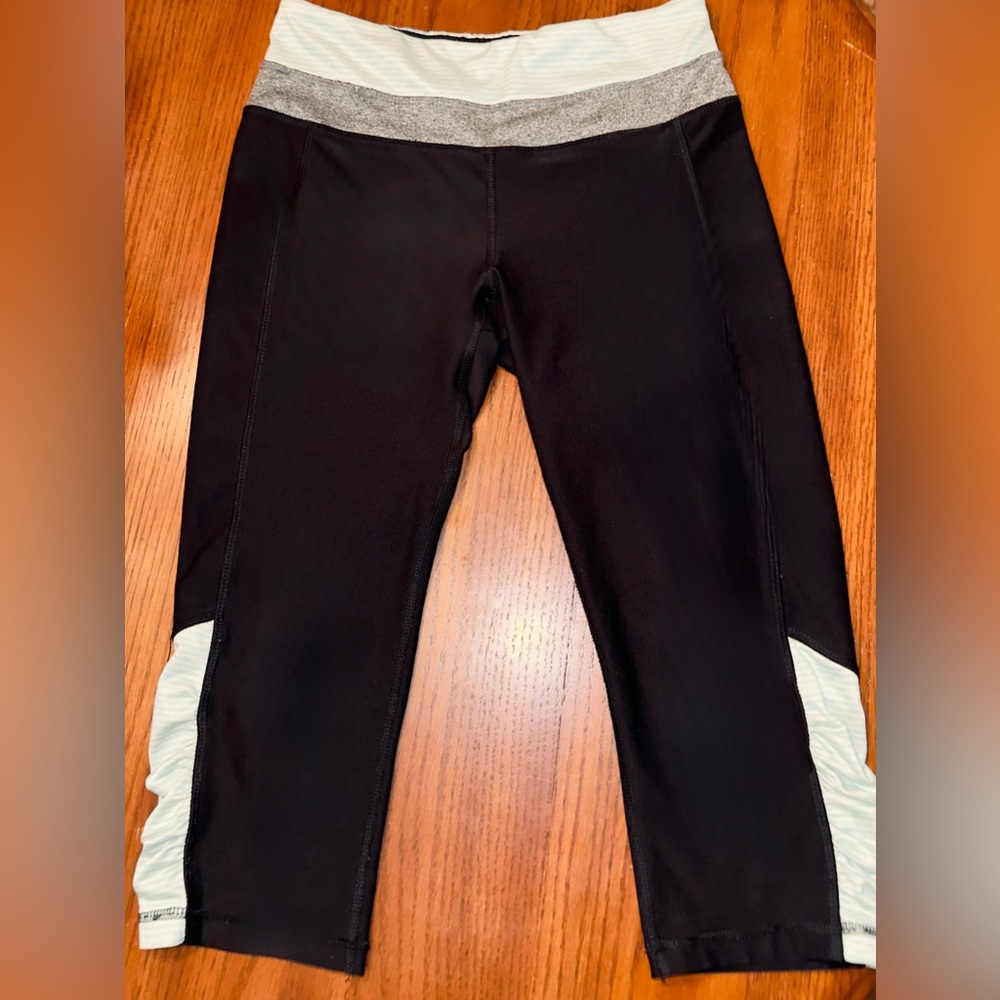 Women’s RBX activewear and light teal running capri legging